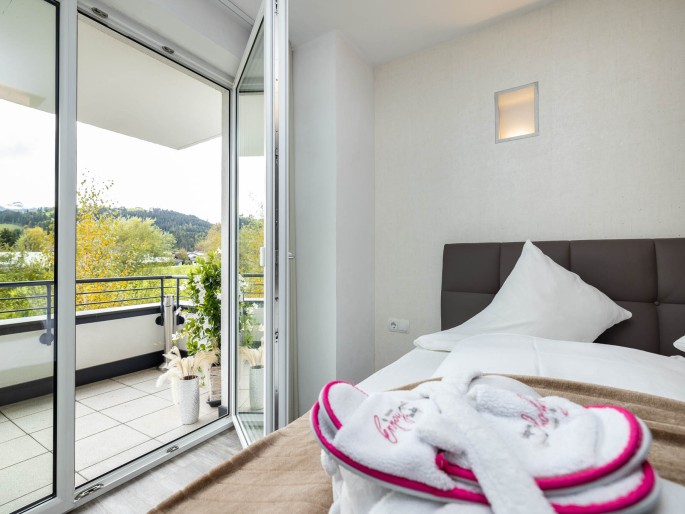 Schlafzimmer mit Balkon