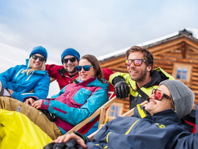 Sonne tanken im Schnee © Flachau Tourismus